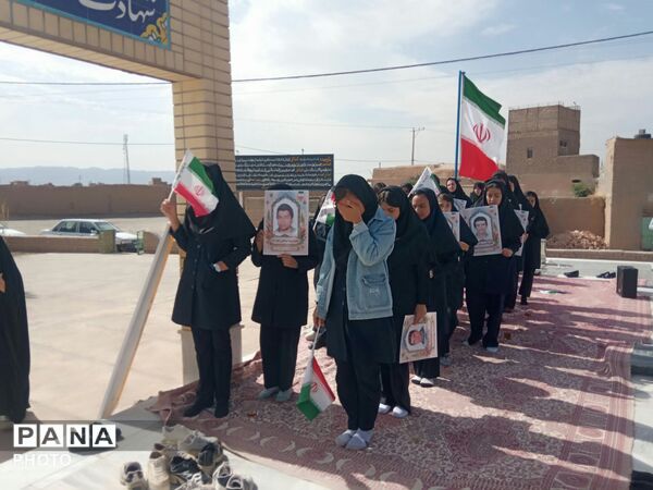 مراسم گرامیداشت هفته دفاع مقدس در روستای بزنجرد خلیل آباد 