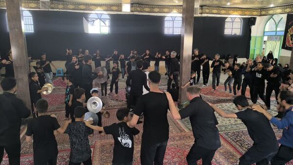 مراسم عزاداری و زنجیرزنی تاسوعای حسینی در شهر حسن آباد جرقویه علیا 