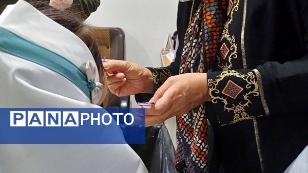 اجرای طرح وارنیش فلوراید در دبستان لطیفه 