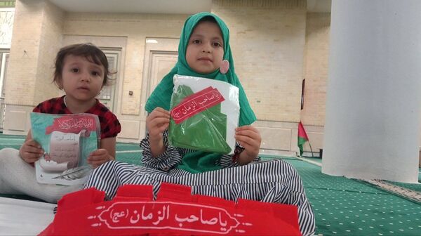 بسته‌بندی لباس همایش شیرخوارگان حسینی زنجان