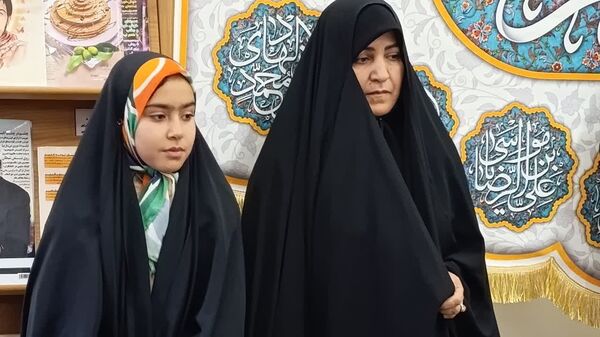 تقدیر از مادر شهید مهدی زاهدلویی در کتابخانه امام علی(ع) قم