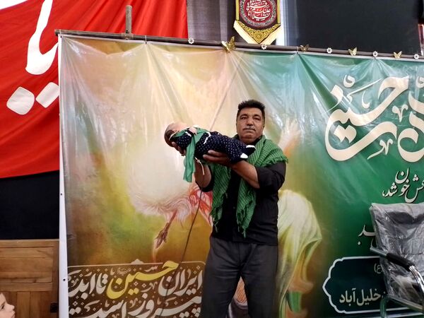 برگزاری مراسم شیرخوارگان حسینی در خلیل آباد