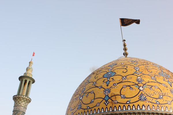 آیین مذهبی تعویض پرچم گنبد حرم مطهر حضرت سلطانعلی ابن امام محمد باقر(ع)