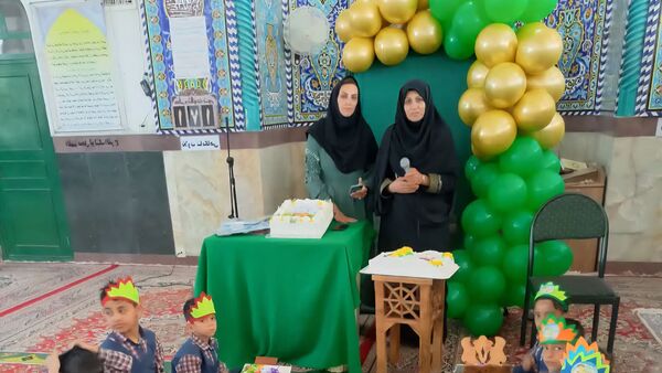 مراسم عهد و پیمان با قرآن در دبستان قمر بنی هاشم شهرستان زارچ 