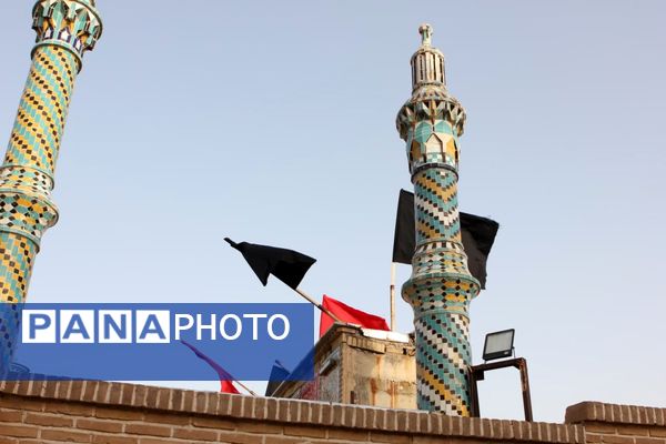 آیین مذهبی تعویض پرچم گنبد حرم مطهر حضرت سلطانعلی ابن امام محمد باقر(ع)