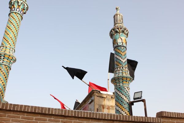 آیین مذهبی تعویض پرچم گنبد حرم مطهر حضرت سلطانعلی ابن امام محمد باقر(ع)