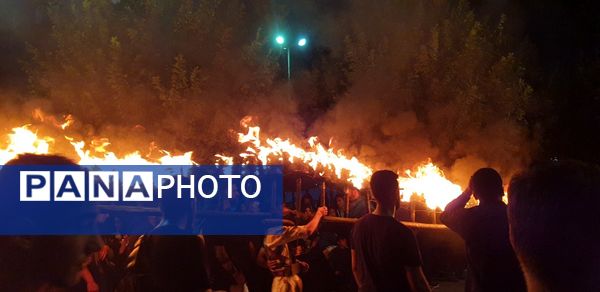 آیین مشعل‌گردانی نجفی‌های مقیم قم