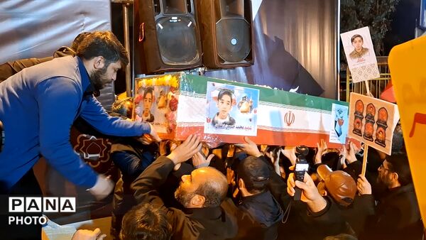 آیین وداع با پیکر دانش آموز شهید محمد حسین دهقان در قم