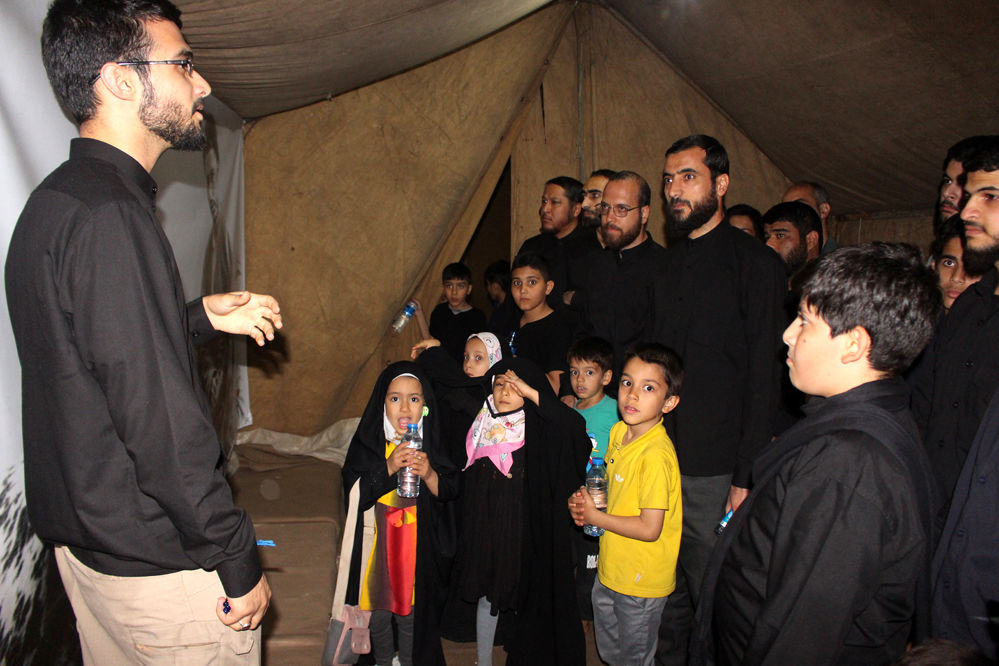 روایتگری طلاب جوان در یادواره شهدای مدرسه حقانی قم