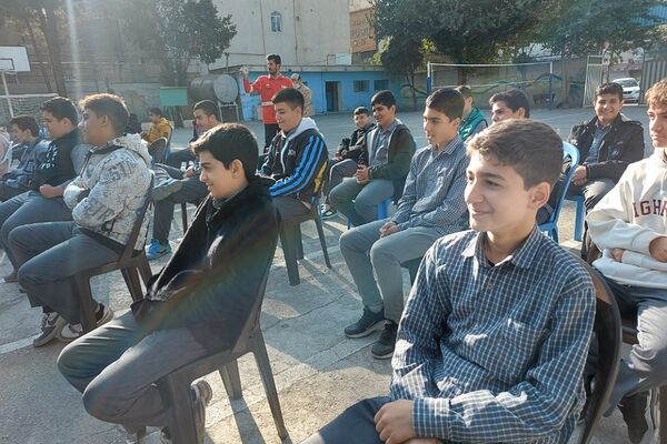 آیین نواختن زنگ پدافند غیرعامل در دبیرستان تهرانی باقرشهر 