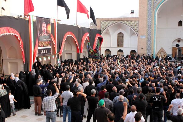 آیین مذهبی تعویض پرچم گنبد حرم مطهر حضرت سلطانعلی ابن امام محمد باقر(ع)