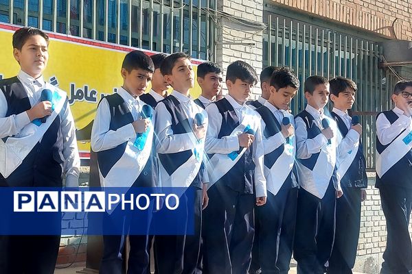 نواختن زنگ پدافند غیرعامل در هنرستان کوثر باقرشهر 