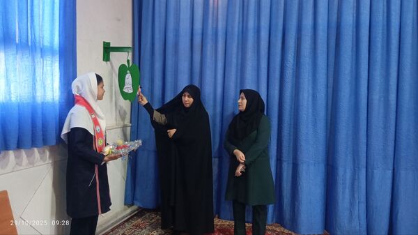 آیین نواختن زنگ پدافند غیرعامل در زاوه