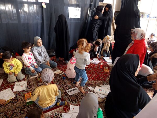 برپایی غرفه کودک در حاشیه نماز جمعه شهرستان کاشمر