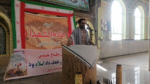 نمایشگاه شهدایی وروایتگری راوی دفاع مقدس در گلزار شهدای شهر بار نیشابور 