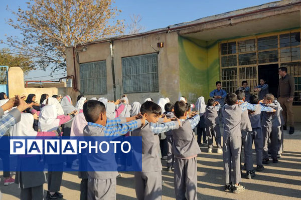 مراسم صبحگاهی دبستان شهید رحمت الله قلعه یزدانی و آموزشگاه آیت الله اراکی