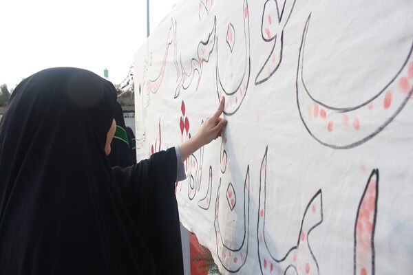 مراسم دومین سالگرد خاکسپاری شهید گمنام آموزشکده فنی دختران قم