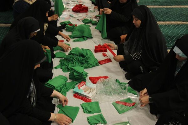 بسته‌بندی لباس همایش شیرخوارگان حسینی زنجان