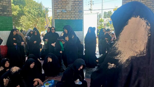 آیین سنتی «گل مالی» در روز عاشورا