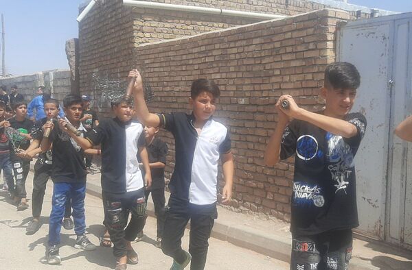 عزاداری روز عاشورای حسینی در روستای حسن آباد بلهر 