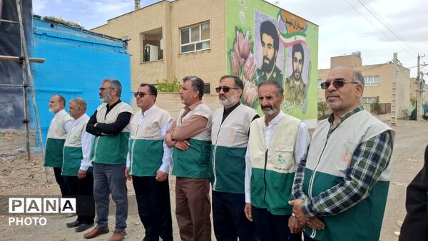 آیین اهتزاز پرچم امام رضا(ع) و رونمایی از دیوارنگاره کودکان میناب در شهر کهک
