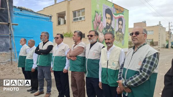 آیین اهتزاز پرچم امام رضا(ع) و رونمایی از دیوارنگاره کودکان میناب در شهر کهک