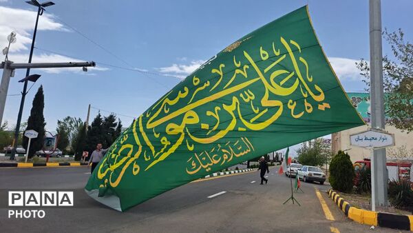 آیین اهتزاز پرچم امام رضا(ع) و رونمایی از دیوارنگاره کودکان میناب در شهر کهک