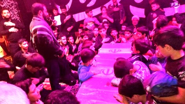 مراسم شب چهلم شهید صالح نوربخش در کنار شهید گمنام