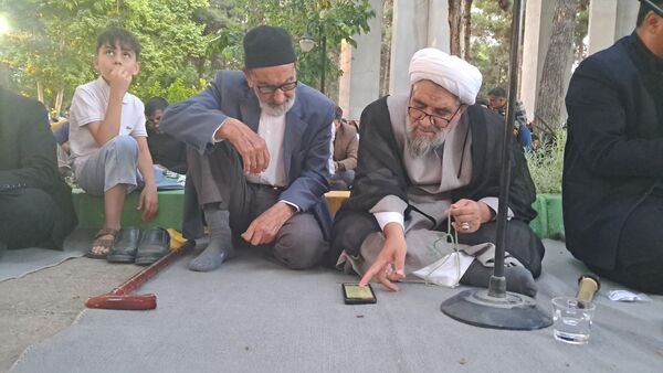 مراسم دعای عرفه درجوار شهدای گمنام پارک وحدت شهرستان آشخانه