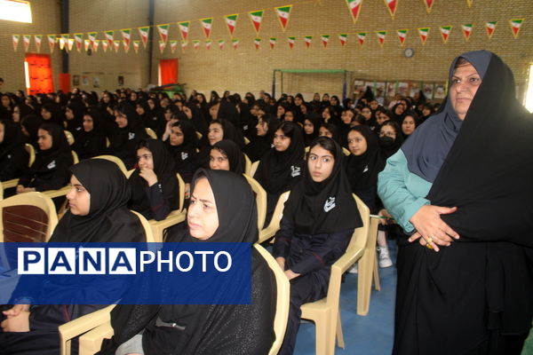 نواختن زنگ آغاز سال تحصیلی در دبیرستان شهیده سهام خیام  شاهد بوشهر