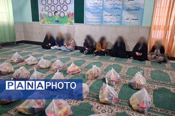 توزیع بسته‌های معیشتی در مدرسه عمار نصیرشهر
