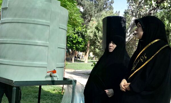  مراسم ختم دعای عرفه کنار مزار شهدای گمنام نسیم شهر 