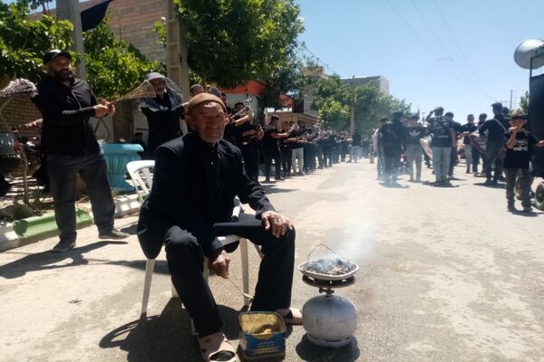 برگزاری مراسم گرامیداشت تاسوعای حسینی در شهر تیتکانلو 