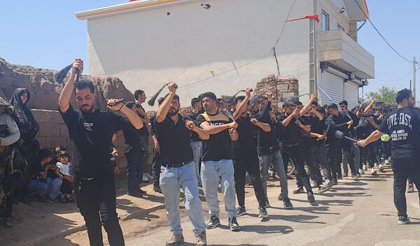 عزاداری ظهر عاشورا در روستای حسن آباد بلهر 