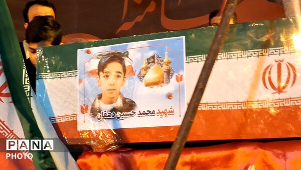 آیین وداع با پیکر دانش آموز شهید محمد حسین دهقان در قم