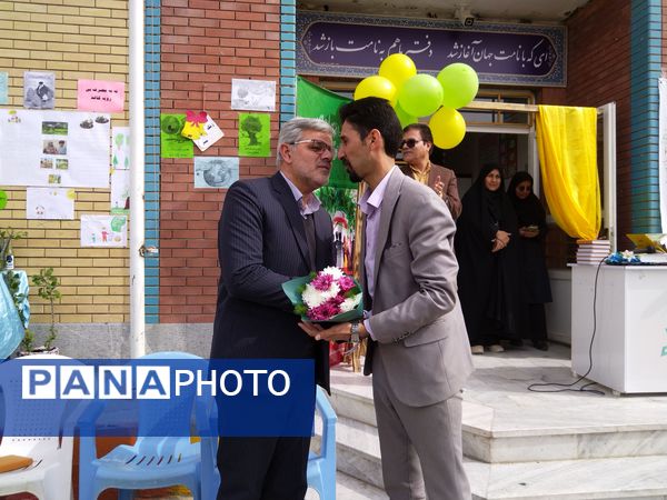 روز درختکاری و روز آموزش همگانی حفظ محیط زیست در مدرسه پویندگان فرهنگ شهرستان خلیل آباد 
