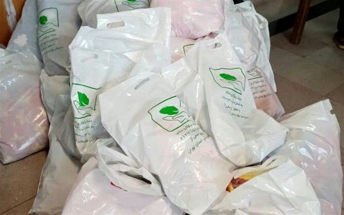 تحویل لباس گرم به مددجویان توسط بهزیستی ملارد