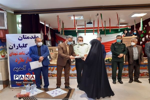 نواختن زنگ ایثار و شهادت  را مدرسه شهدای اقتدار ملارد