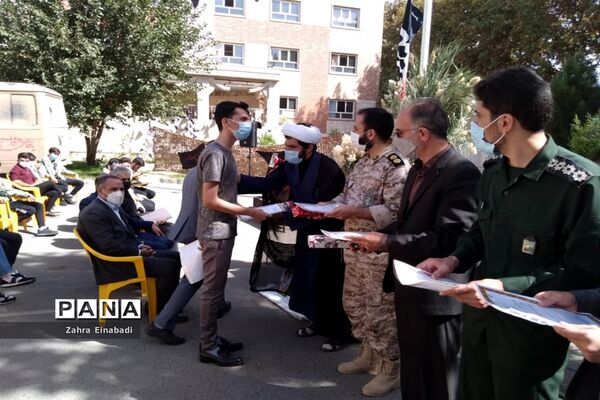 برگزاری مراسم گرامیداشت شهدا در اداره آموزش و پرورش ملارد