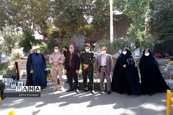 برگزاری مراسم گرامیداشت شهدا در اداره آموزش و پرورش ملارد