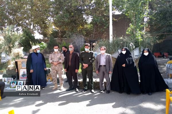 برگزاری مراسم گرامیداشت شهدا در اداره آموزش و پرورش ملارد