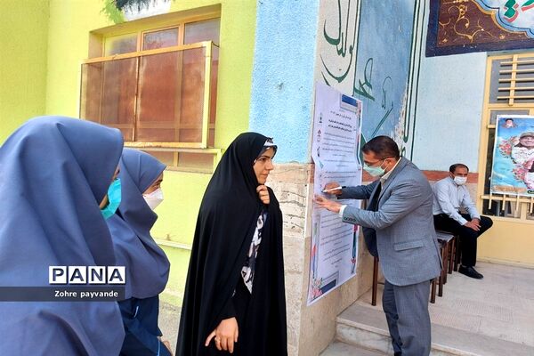 نواختن زنگ ایثار و شهادت در شهرستان ملارد