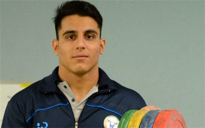 گلایه‌های تلخ قهرمان ایرانی وزنه‌برداری جهان: در اردوی تهران آب معدنی را هم خودمان خریدیم