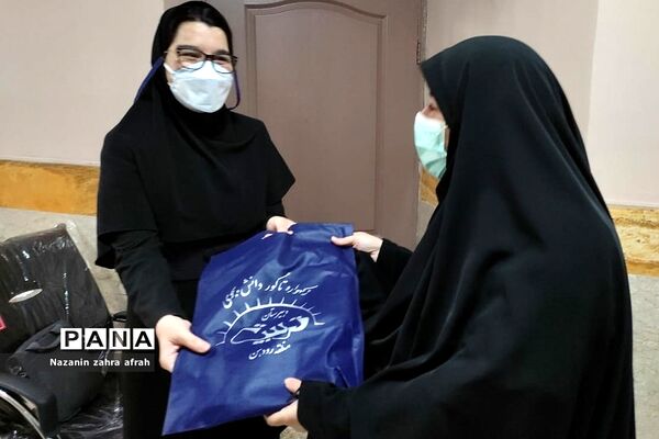 مراسم تقدیر از دانش‌آموزان و دبیران مدرسه تربیت رودهن