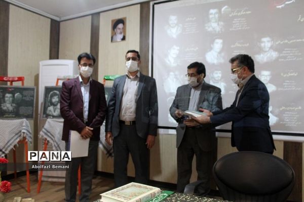 آیین رونمایی از تابلوی تصاویر معلمان شهید ناحیه یک قم