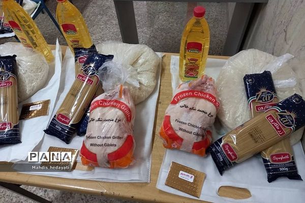 توزیع بسته‌های حمایتی به خانواده‌های نیازمند در هنرستان مبتکران رودهن