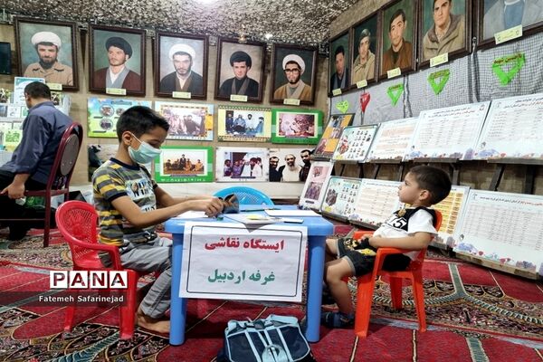 نمایشگاه «تعهد سرخ، از حجره تا سنگر» در قم-1