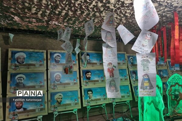 نمایشگاه «تعهد سرخ، از حجره تا سنگر» در قم-1