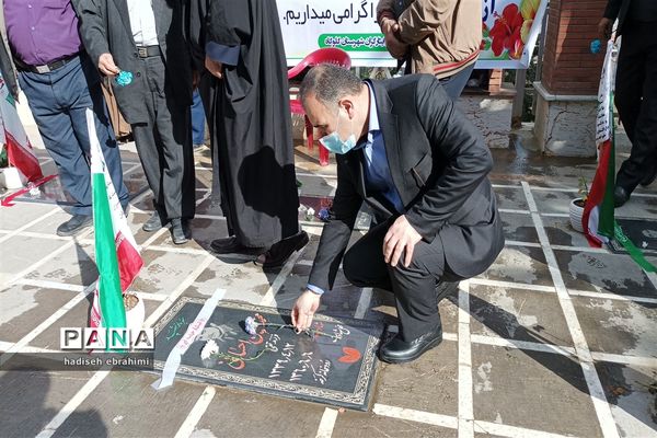 غبارروبی و عطر افشانی گلزار شهدا در گلوگاه