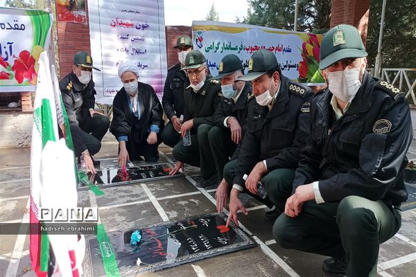 غبارروبی و عطر افشانی گلزار شهدا در گلوگاه